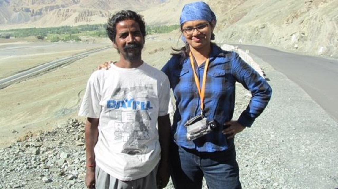 Film director Indrani Chakrabarti with rickshaw driver Satyen Das. (Supplied)