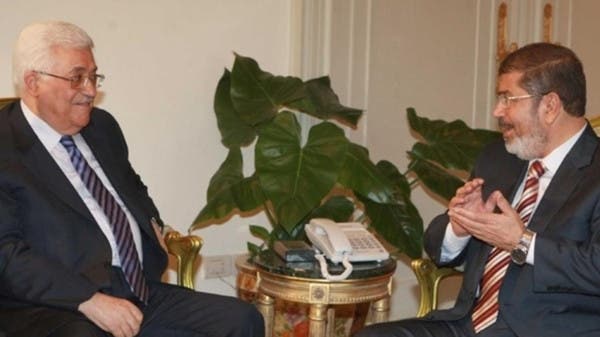 لقاء سابق بين الرئيس المخلوع محمد مرسي والريس محمود عباس