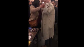 WATCH: Iranian academic beats up female activist at Brussels event