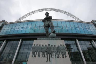 A statue of former England football captain Bobby Moore stands outside Wembley Stadium in west London, on April 27, 2018. The Football Association have received an offer to buy iconic Wembley stadium in a shock move that increases the chances of an NFL team taking up permanent residence in London. (AFP)