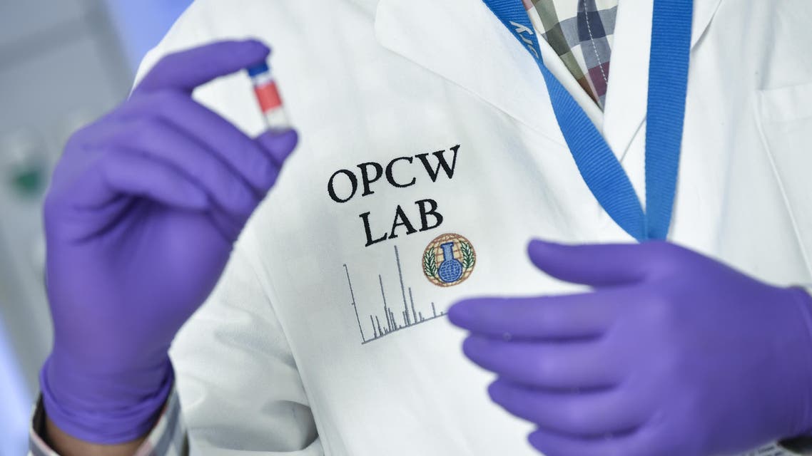 A laboratory technician controls a test vial at the OPCW (The Organisation for the Prohibition of Chemical Weapons) headquarters in the Hague, The Netherlands, on April 20, 2017. Tucked away in a small industrial zone in the Dutch suburb of Rijswijk, the two-storey building, with about 20 staff, has been key to the two decades of painstaking work by the Organisation for the Prohibition of Chemical Weapons (OPCW) to eliminate the world's toxic arms stockpiles. (AFP)