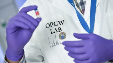 A laboratory technician controls a test vial at the OPCW (The Organisation for the Prohibition of Chemical Weapons) headquarters in the Hague, The Netherlands, on April 20, 2017. Tucked away in a small industrial zone in the Dutch suburb of Rijswijk, the two-storey building, with about 20 staff, has been key to the two decades of painstaking work by the Organisation for the Prohibition of Chemical Weapons (OPCW) to eliminate the world's toxic arms stockpiles. (AFP)
