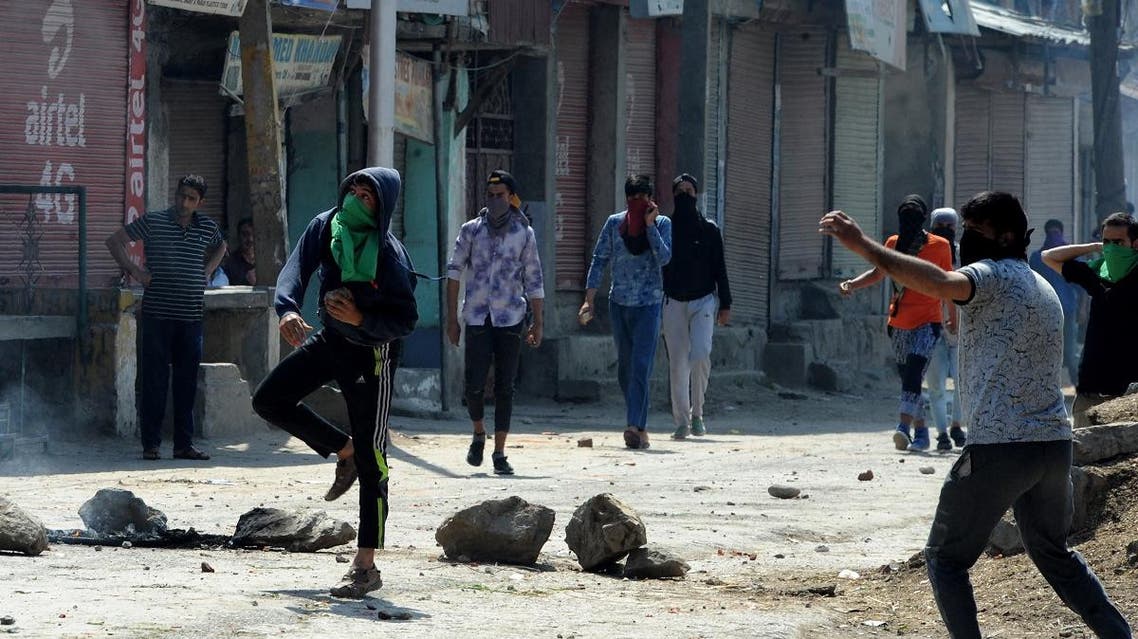 Indian security personnel and protesters clash following a gunbattle between security forces and suspected rebels in Srinagar. (AFP)