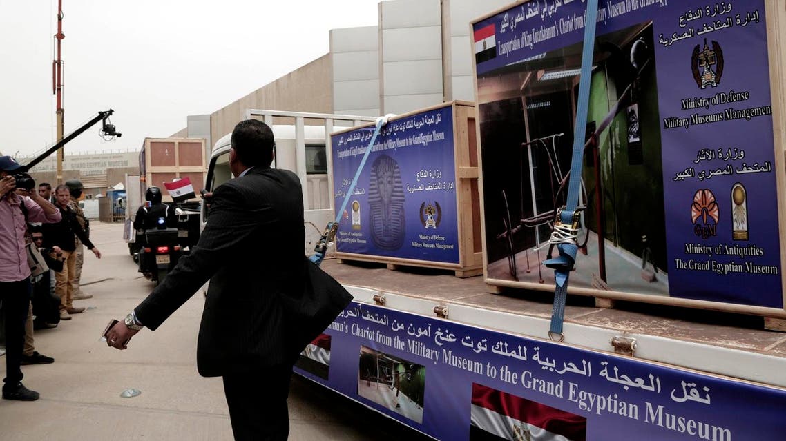 Security forces open the way for the last chariot of famed pharaoh Tutankhamun as it is being transported to the Grand Egyptian Museum in Giza, Saturday, May 5, 2018. (AP)