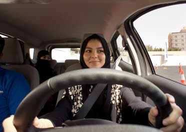 A student at the female-only campus of Effat University, sits for the first time in the driver’s seat, during training sponsored by Ford Motor, in Jeddah on March 6, 2018. (AP)