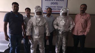 ‘Space suit’ scammers father-son duo paraded in India