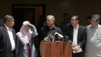 A royal pardon expected for Anwar, Mahathir foe-turned ally            