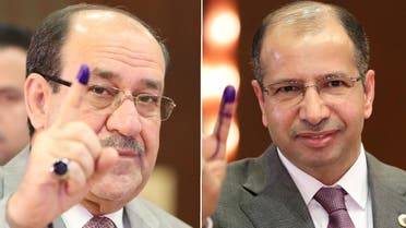 President of the Iraqi Parliament, Salim al-Jubouri (R) also issued a similar warning after casting his vote. (Reuters)