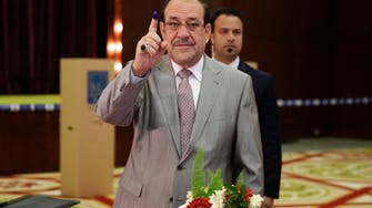 Former Iraqi PM Nouri al-Maliki casts vote at parliamentary elections 