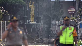 Indonesia links deadly church attacks to local ISIS-inspired group