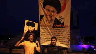 Iraq’s Sadr supporters chant ‘Iran is out’ while celebrating electoral victory