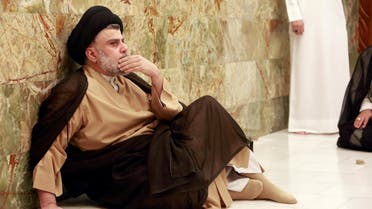 Iraqi Shiite cleric Muqtada al-Sadr visits his father's grave after parliamentary election results were announced, in Najaf, Iraq May 14, 2018. (Reuters)