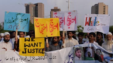 Pakistani protesters carry placards during a demonstration against the killing of a local resident in a car accident involving a US diplomat in Islamabad on April 25, 2018. (AFP)