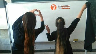 WATCH: Iranian girls react to teacher’s punishment of student with long hair