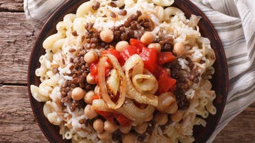 Koshari – a hearty, carb-rich dish, mainly consisting of rice, pasta, chickpeas and lentils. (Shutterstock)