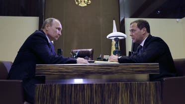 Russian President Vladimir Putin (L) meets with Prime Minister Dmitry Medvedev in Sochi, Russia May 15, 2018. Sputnik/Ekaterina Shtukina/Pool via REUTERS ATTENTION EDITORS - THIS IMAGE WAS PROVIDED BY A THIRD PARTY.