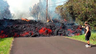 Homeowners scramble as Hawaii volcano continues to emit lava, ash