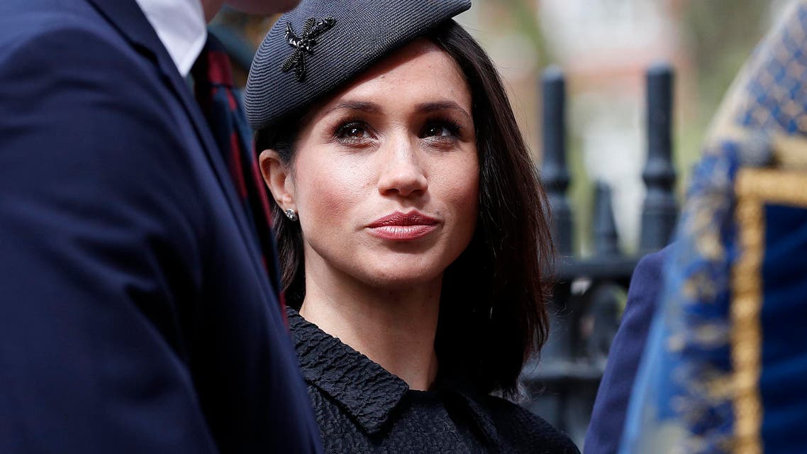 (FILES) In this file photo taken on April 25, 2018 US fiancée of Britain's Prince Harry, Meghan Markle, talks with Britain's Prince William, Duke of Cambridge (L) as she arrives to attend a service of commemoration and thanksgiving to mark Anzac Day in Westminster Abbey in London. Thomas Markle, who has rocked Britain's royal family with a "will he, won't he" drama over his attendance at daughter Meghan's wedding to Prince Harry, is a shy recluse, thrust into the limelight against his wishes. The 73-year-old initially said he was too unwell and embarrassed to walk his daughter down the aisle on Saturday, according to US celebrity news site TMZ, after allegedly staging photos of himself for money and suffering a heart attack amid the ensuing furor. (AFP)