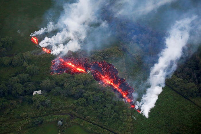 Lava erupts from a fissure east of the Leilani Estates subdivision during ongoing eruptions of the Kilauea Volcano in Hawaii, US, May 13, 2018. (Reuters)