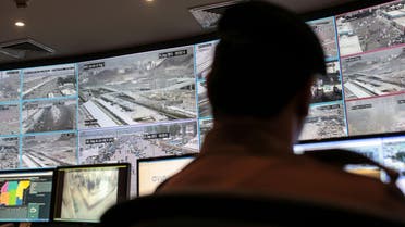 A security officer monitors pilgrims attending the annual hajj pilgrimage on CCTV screens at a security command center in Mina on Sept. 25 2015. (AP)