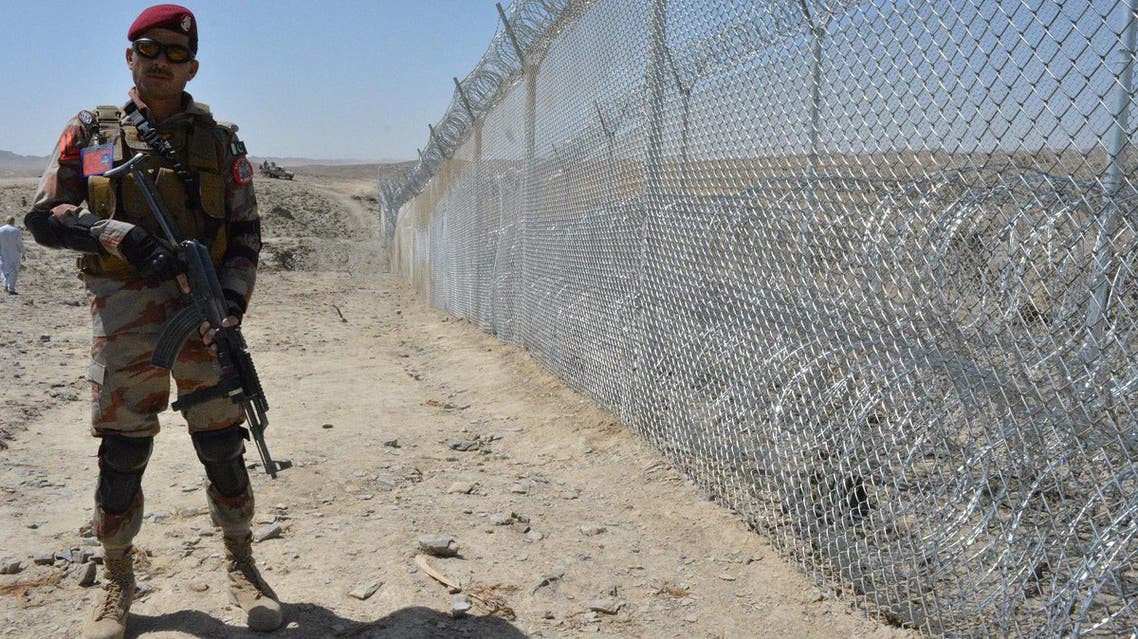 A Pakistani army soldier stands guard along with border fence at the Pak-Afghan border near the Punjpai area of Quetta in Balochistan on May 8, 2018. (AFP)