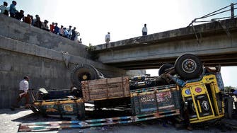 Nineteen dead as truck loaded with cement overturns in India