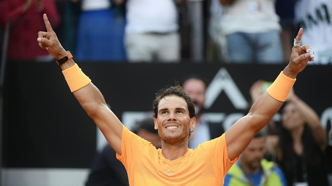 Rafael Nadal celebrates after winning the Men’s final against Alexander Zverev at Rome’s ATP Tennis Open tournament at the Foro Italico, on May 20, 2018. (AFP)