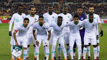 Saudi players pose for a team group photo before their friendly game against Belgium. (Reuters)