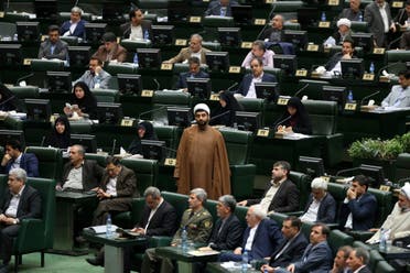 Iranian cleric lawmaker Ahad Azadikhah, center, during a session of parliament in Tehran, on Aug. 15, 2017. (AP)