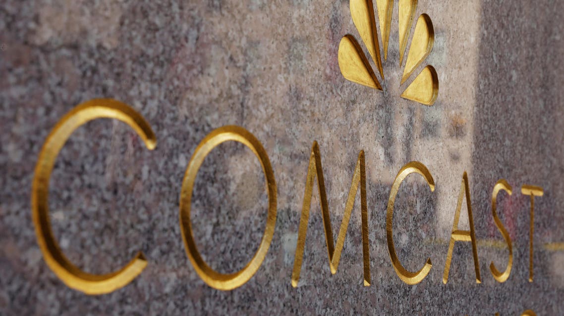 The NBC and Comcast logos are displayed on 30 Rockefeller Plaza in midtown Manhattan in New York, U.S., February 27, 2018. REUTERS/Lucas Jackson