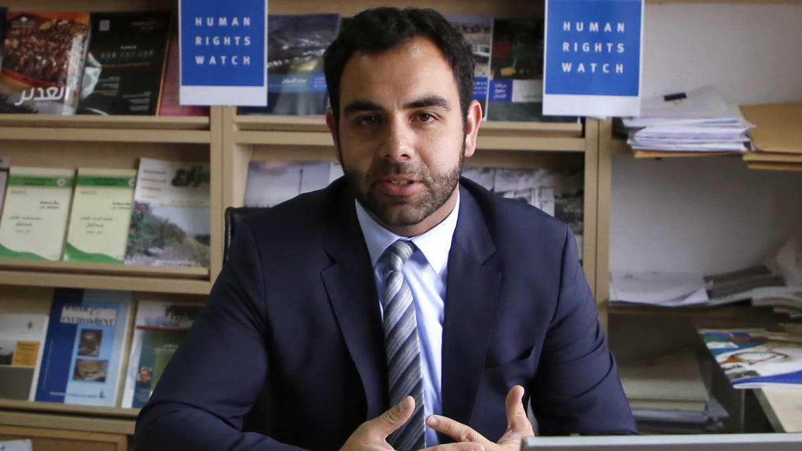 Human Rights Watch's Israel and Palestine director Omar Shakir, a US citizen, sits at his office in the West Bank city of Ramallah on May 9, 2018. Israel has given the Human Rights Watch director two weeks to leave the country, accusing him of promoting a boycott, in a move the rights group said sought to muzzle criticism. ABBAS MOMANI / AFP