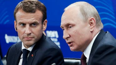 Putin and Macron (AFP)