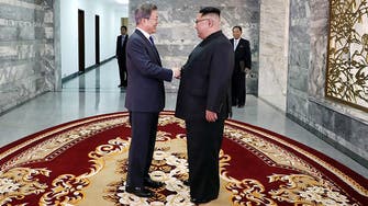  Leaders of two Koreas hold surprise meeting as Trump revives hopes of summit 