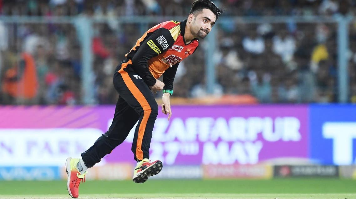 Sunrisers Hyderabad cricketer Rashid Khan bowls during the 2018 Indian Premier League(IPL) Twenty20 second Qualifier cricket match against Kolkata Knight Riders at The Eden Gardens Cricket Stadium in Kolkata on May 25, 2018. (AFP)