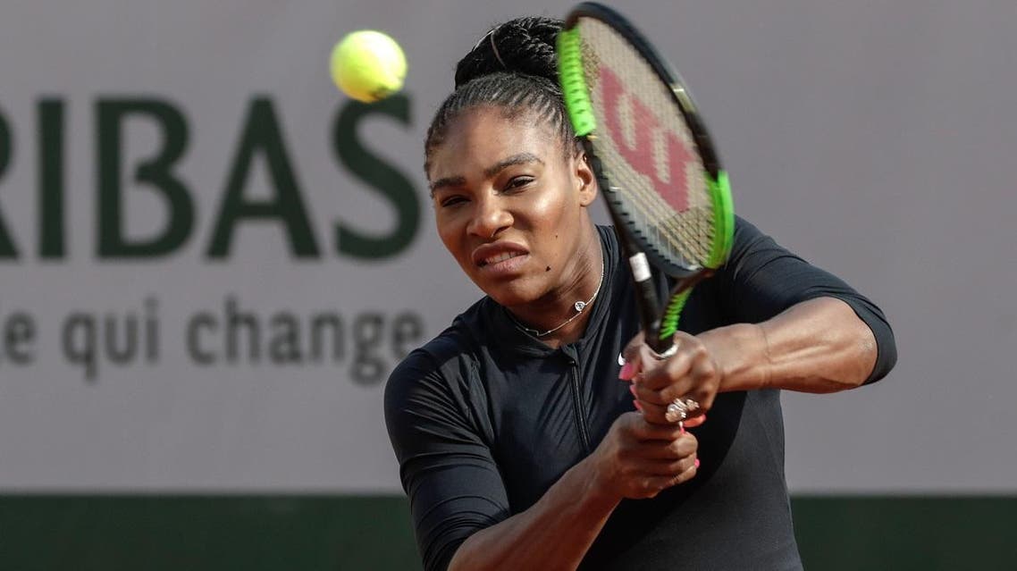 Serena Williams returns a shot during a training session at the Roland Garros stadium. (AFP)