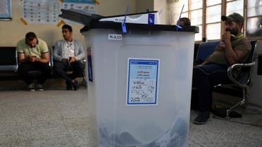 A ballot box is seen after voting ended at a polling station during the parliamentary election in Baghdad, Iraq May 12, 2018. REUTERS/Marius Bosch
