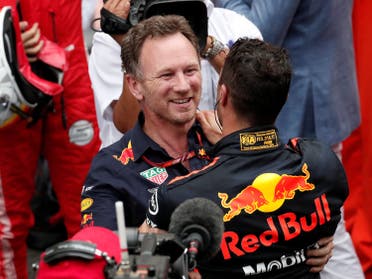 Red Bull’s Daniel Ricciardo celebrates winning the race with Red Bull Team Principal Christian Horner (Reuters)