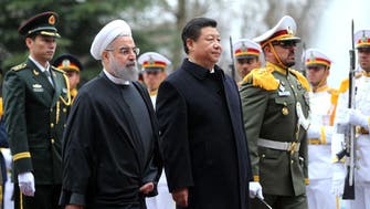 China to host Iranian President Rouhani amid nuclear deal doubt