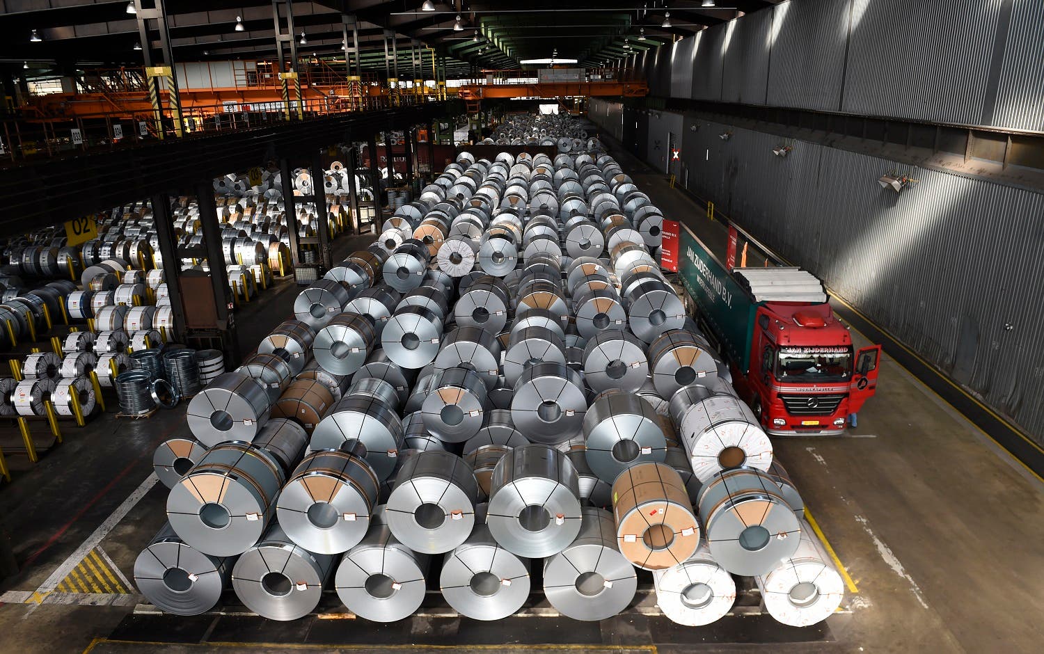 Steel coils are stored for delivery at the production site of German steel technology group Salzgitter AG in Salzgitter. (AFP)