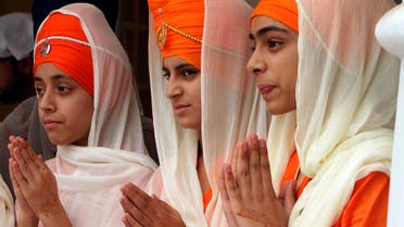 Sikh girls attend a religious festival to celebrate the 549th birth anniversary of their spiritual leader Baba Guru Nanak, at Nankana Sahib near Lahore, Pakistan, on Nov. 4, 2017. (AP)