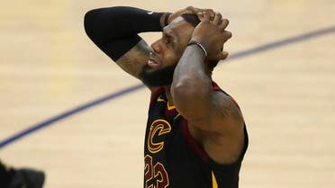 Cleveland Cavaliers forward LeBron James reacts to a call during the second half of Game 1 of basketball's NBA Finals between the Golden State Warriors and the Cavaliers in Oakland, Calif., Thursday, May 31, 2018. (AP Photo/Ben Margot)