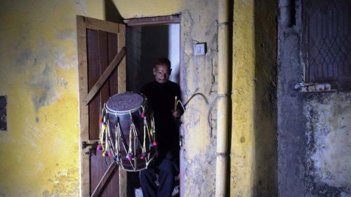 Pakistani Lal Hussain has been faithfully hitting the streets every Ramadan for the last 35 years. (AFP)