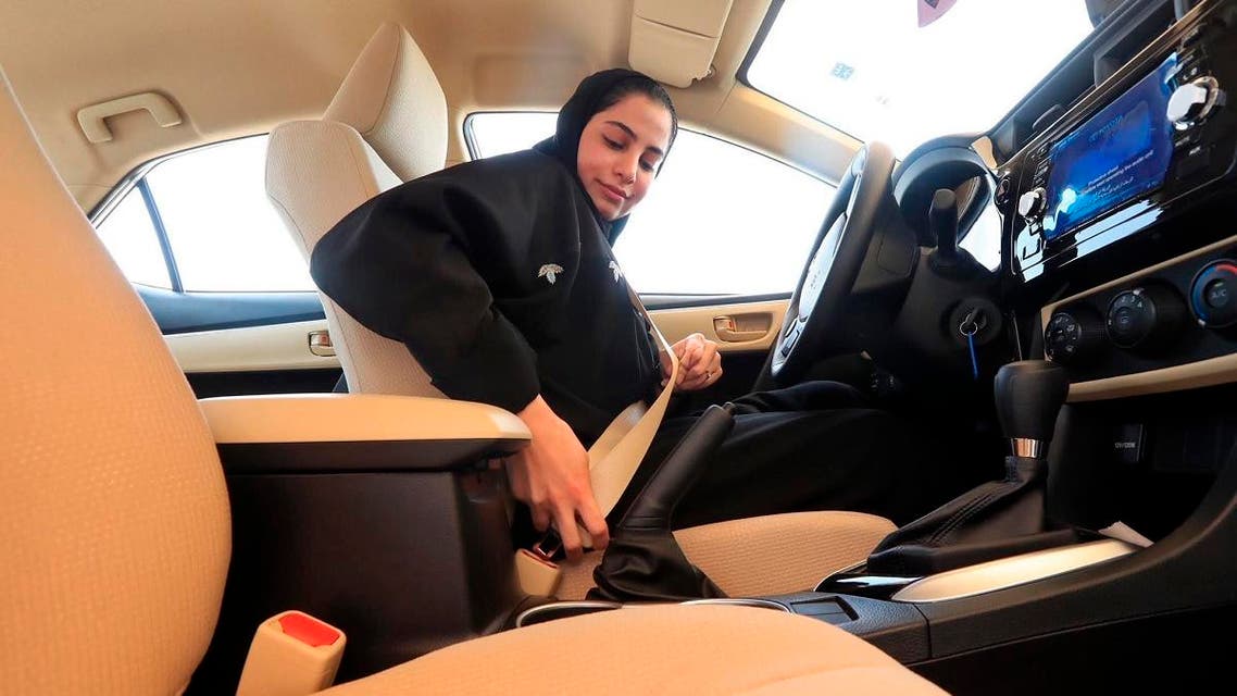 A Saudi woman buckling her seat belt before doing a driving test at the General Department of Traffic in the Saudi capital of Riyadh. (AP)