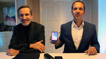 TCL Communications head of research Alain Lejeune (L) and chief executive Nicolas Zibell pose at the Consumer Electronics Show in Las Vegas on January 4, 2017 to discuss the Chinese electronics titan's plan to breathe new life into BlackBerry smartphones. (AFP)