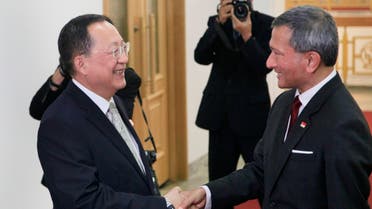 ( SiNGAPORE FOREIGN MINISTER WITH NORTH KOREAN COUNTERPART. (AP)