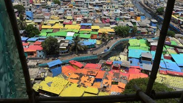 A view of houses painted in bright colors at a fishing area in Mumbai on June 2, 2018. (AFP)