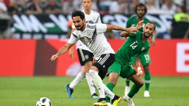 Germany’s Ilkay Gundogan, left, duels for the ball with Saudi Arabia’s Abdullah Otayf during a friendly soccer match between Germany and Saudi Arabia at BayArena in Leverkusen, Germany, Friday. (AP)