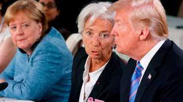 President Donald Trump and International Monetary Fund (IMF) Director Christine Lagarde at the  G7 summit at La Malbaie in Quebec, Canada, on Saturday. (Reuters)