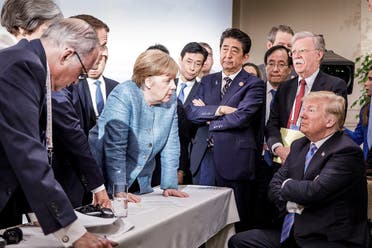 German Chancellor Angela Merkel speaks to U.S. President Donald Trump during the second day of the G7 meeting in 2018. (File photo: Reuters)