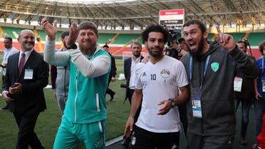 Mohamed Salah (R) and Ramzan Kadyrov during a training of Egyptian team at the Akhmat Arena stadium in Grozny on June 10, 2018. (AFP)
